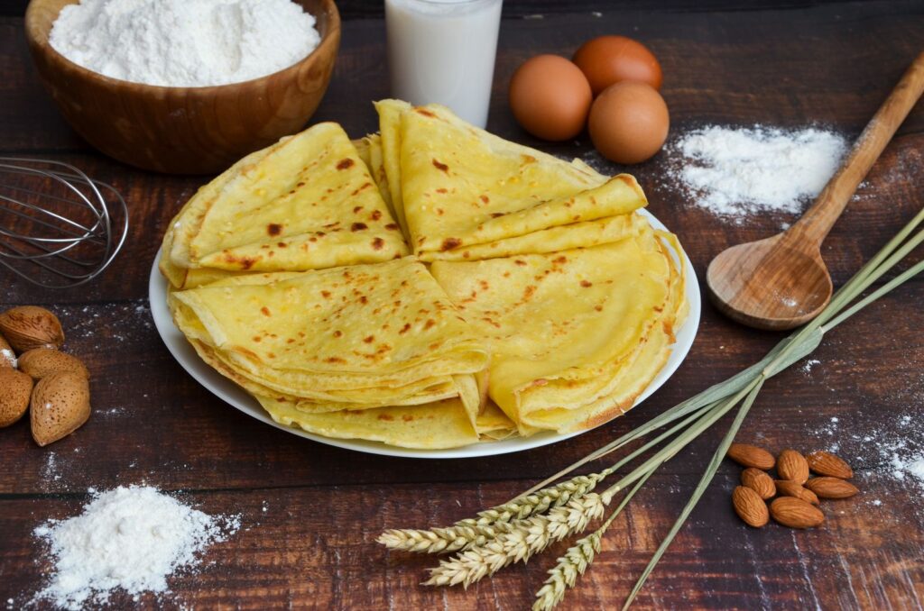 Mariä Lichtmess: Veredeln Sie die Tradition mit Paul Bocuse und unseren Weinen La Chandeleur : Élevez la Tradition avec Paul Bocuse et nos Vins Candlemas: Elevate the Tradition with Paul Bocuse and our Wines